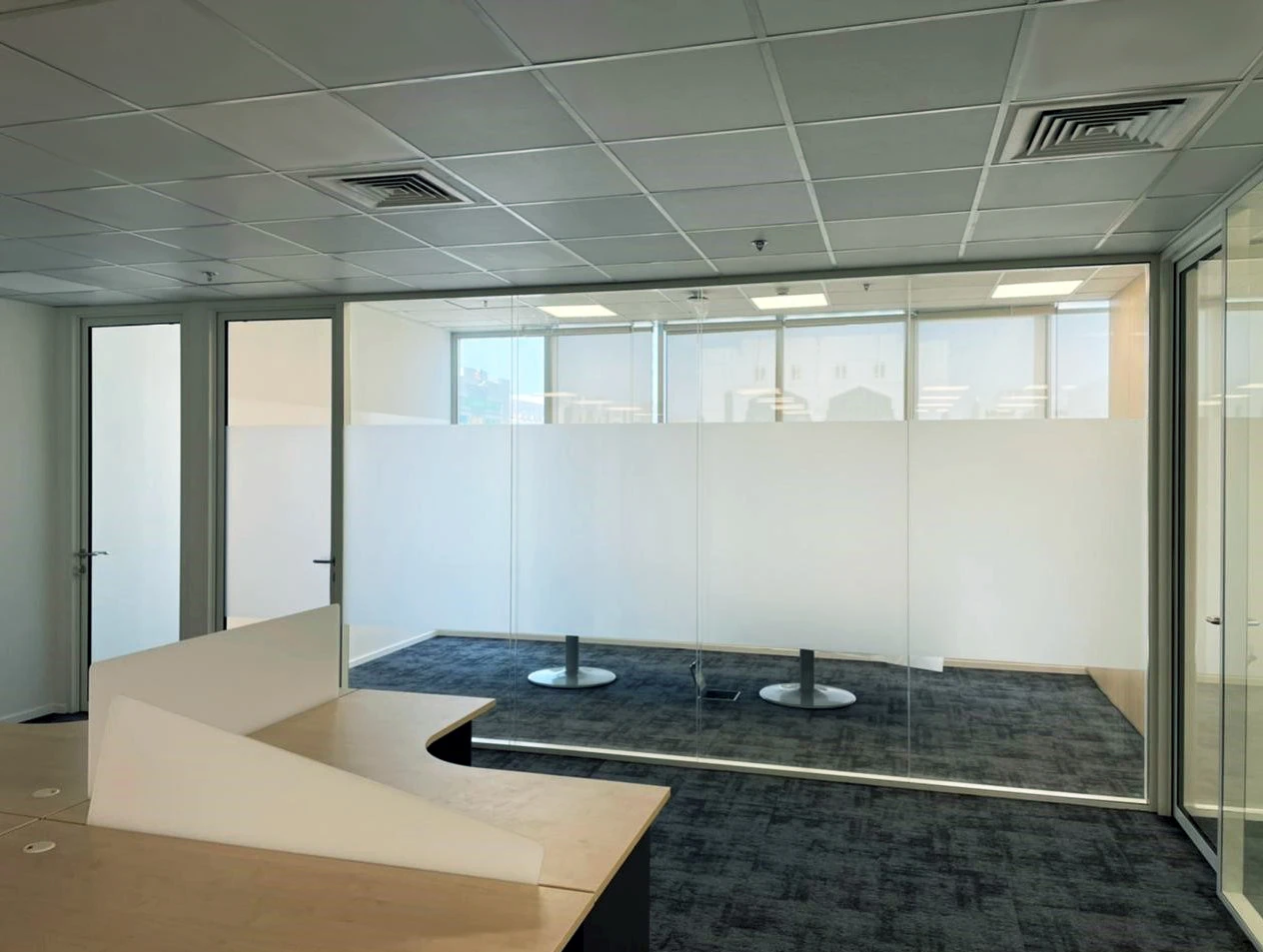 OFFICE PARTITIONS CREATE A CLUTTERED AND CONFINED ENVIRONMENT